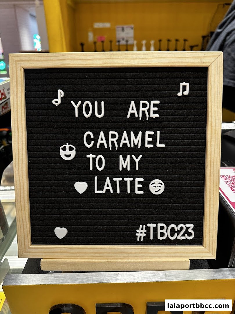 A felt letter board with a cute coffee-themed message and emojis.