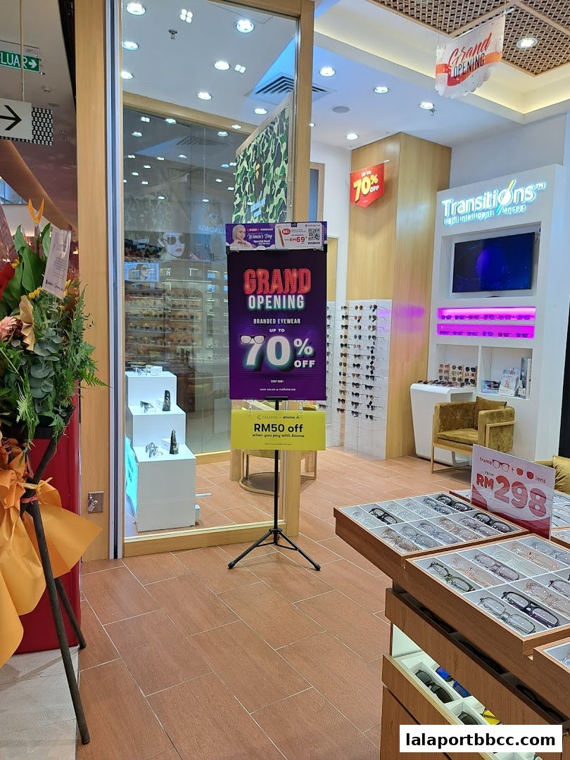 A Calisto Vision Care shop with a grand opening sale and displays of eyewear.