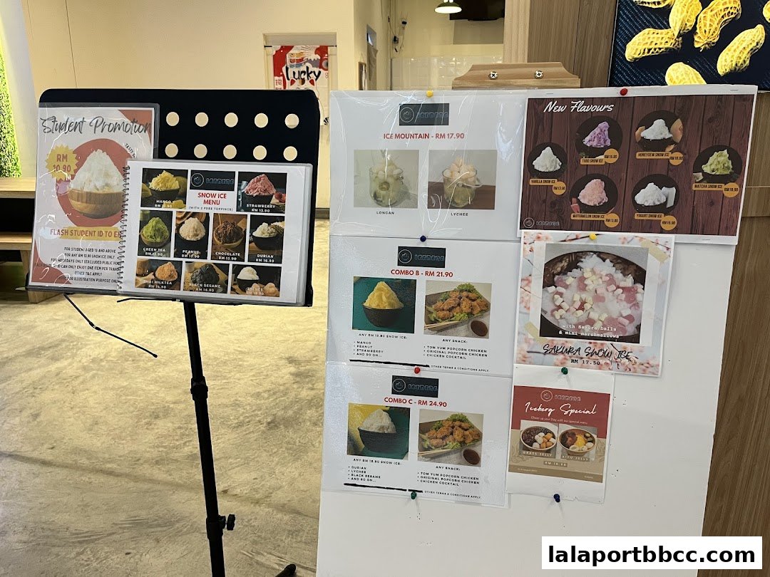 A display of various snow ice flavors, combos, and promotions at Iceberg LaLaport.