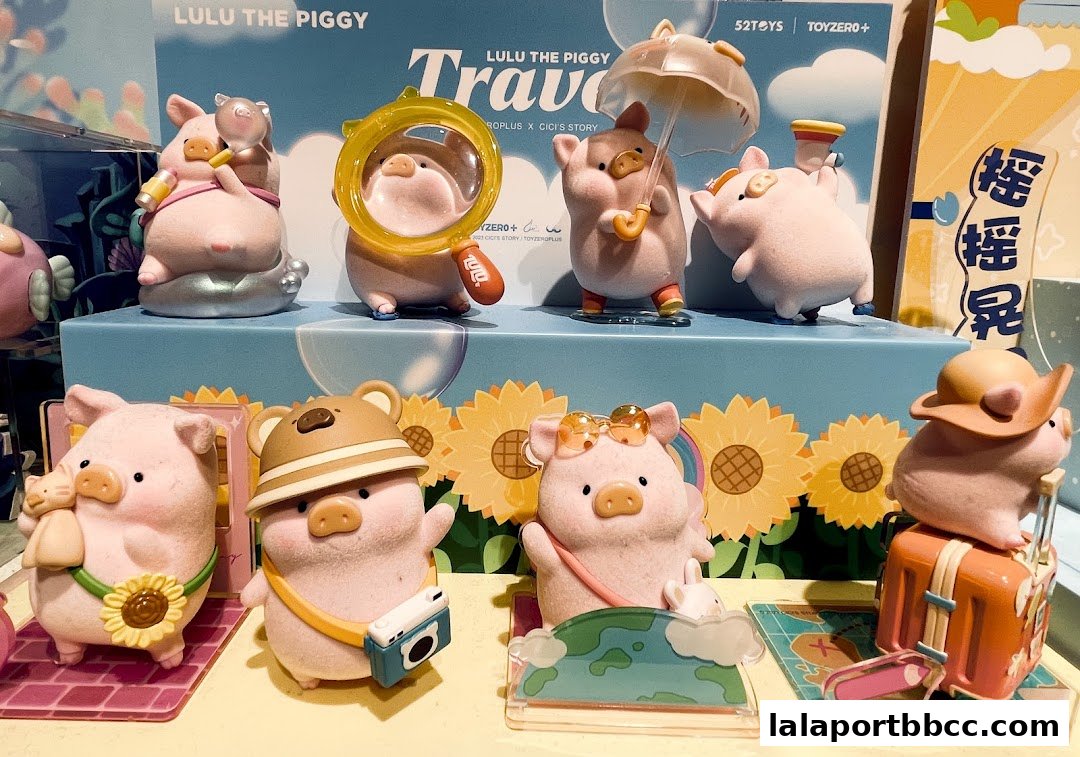 Cute Lulu the Piggy travel-themed collectible figurines displayed in a shop.