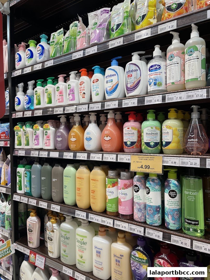 Shelves stocked with a variety of hand soaps, body washes, and lotions.