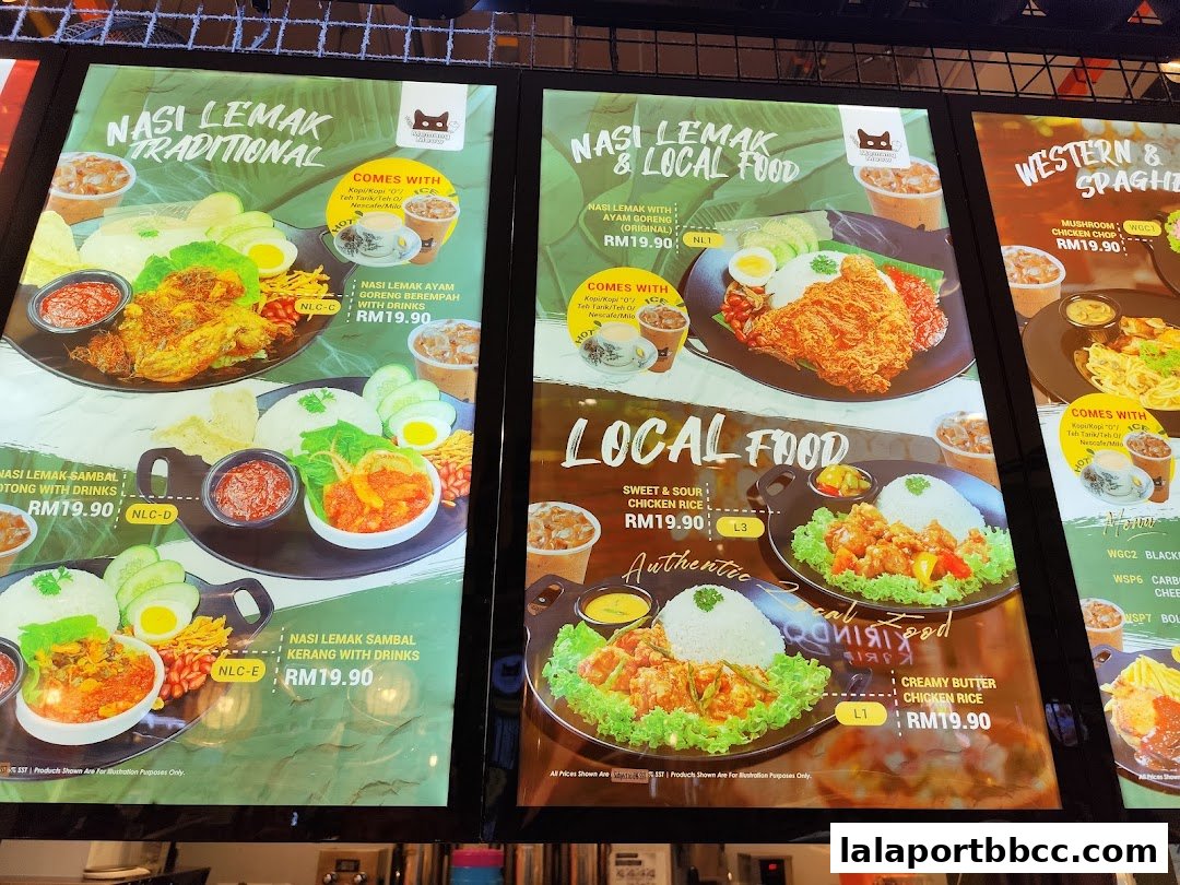 A menu display featuring Nasi Lemak, local food, and Western dishes with prices.