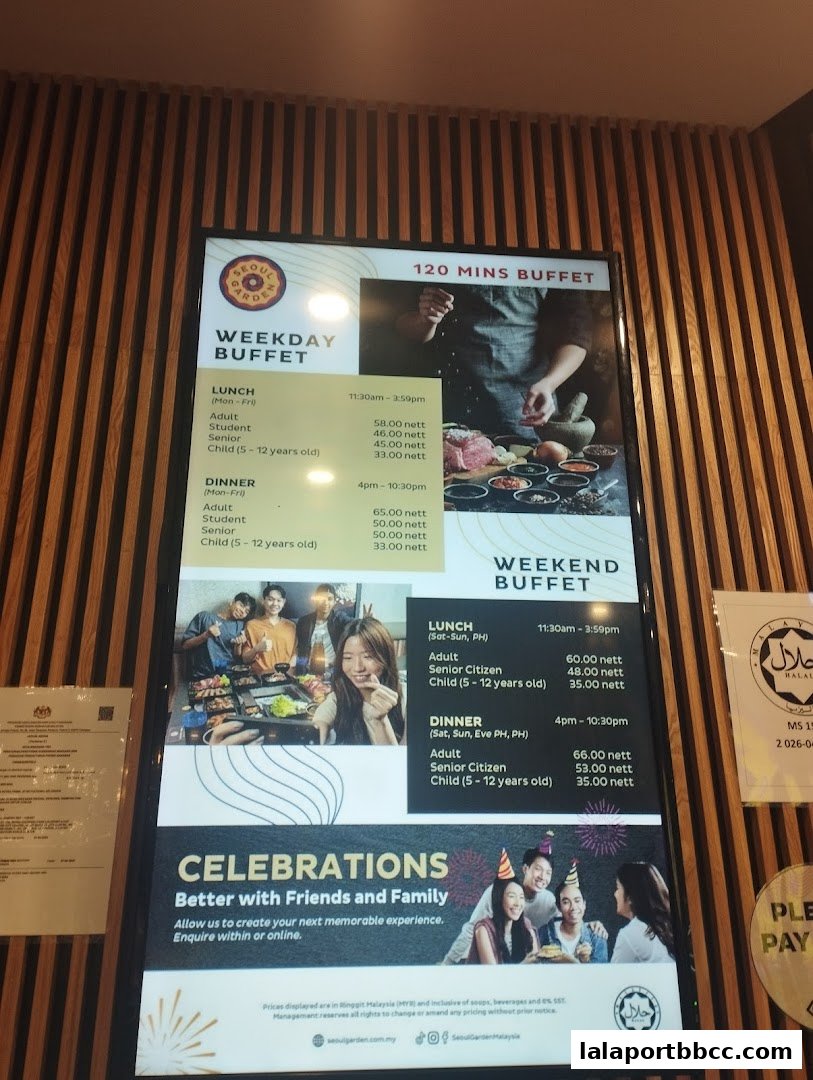 A menu board for Seoul Garden offering weekday and weekend buffet prices and details.