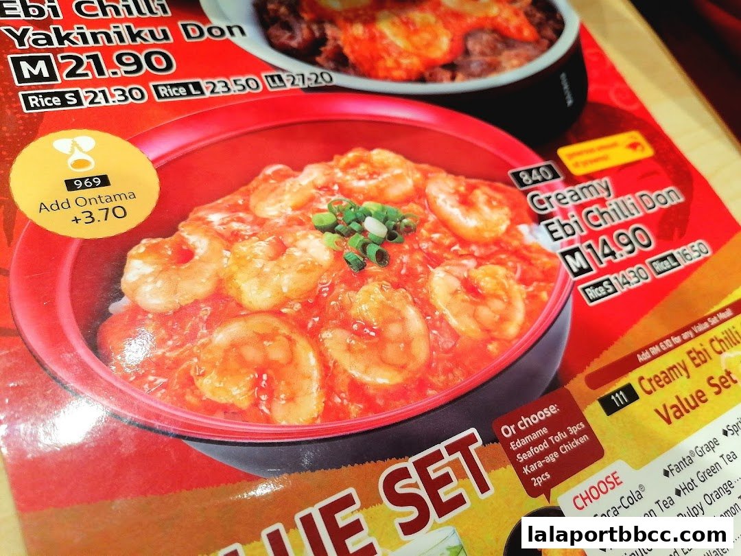 A close-up of a menu featuring Ebi Chilli Yakiniku Don and Creamy Ebi Chilli Don.