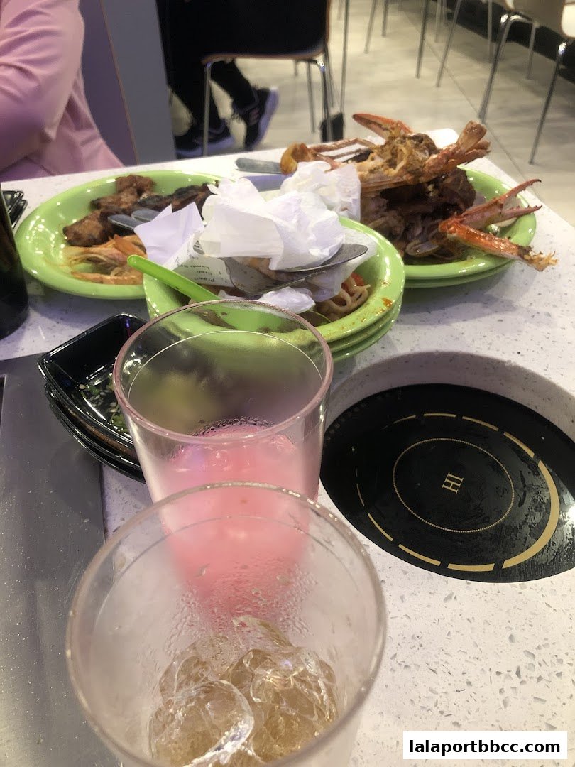 Plates of food and drinks on a table at Seoul Garden Lalaport BBCC.