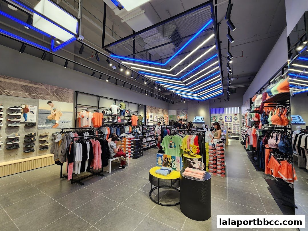 Interior view of a Skechers store showcasing a wide selection of footwear and apparel.
