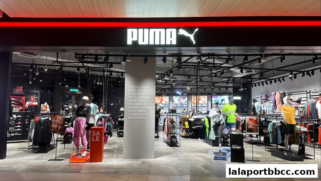 The PUMA store features mannequins showcasing athletic wear and sale signs.