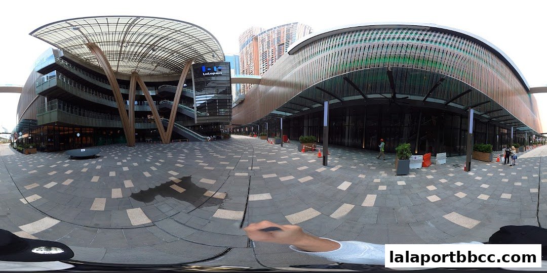 Exterior view of the LaLaport Bukit Bintang City Centre mall with shops and walkways.