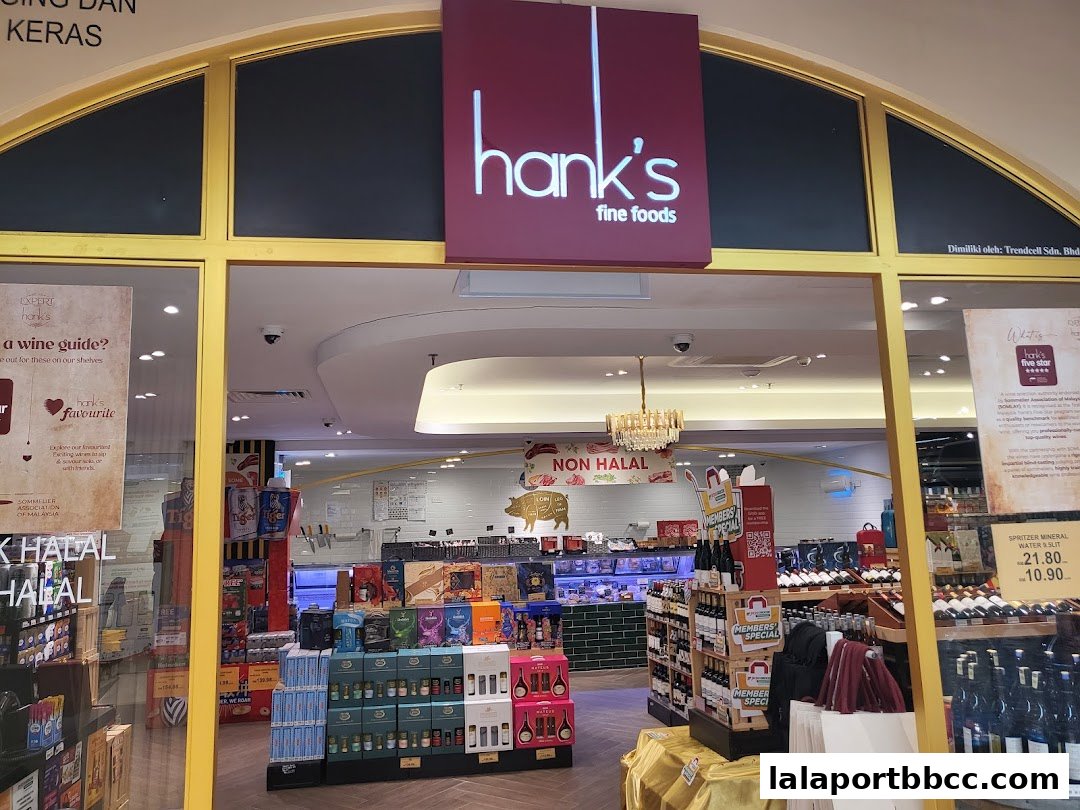 The entrance to Hank's Fine Foods, a grocery store with a wide selection of products.