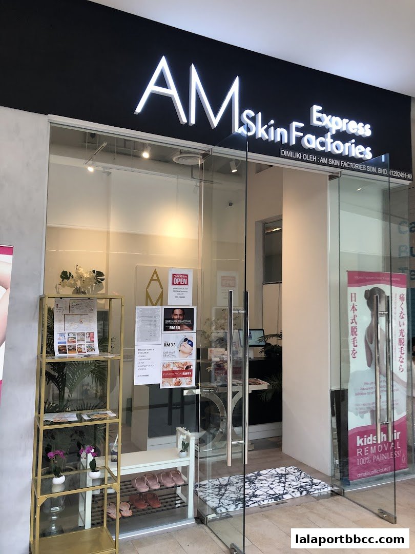 The exterior of AM Skin Factories Express, a beauty salon with a glass storefront and signage.