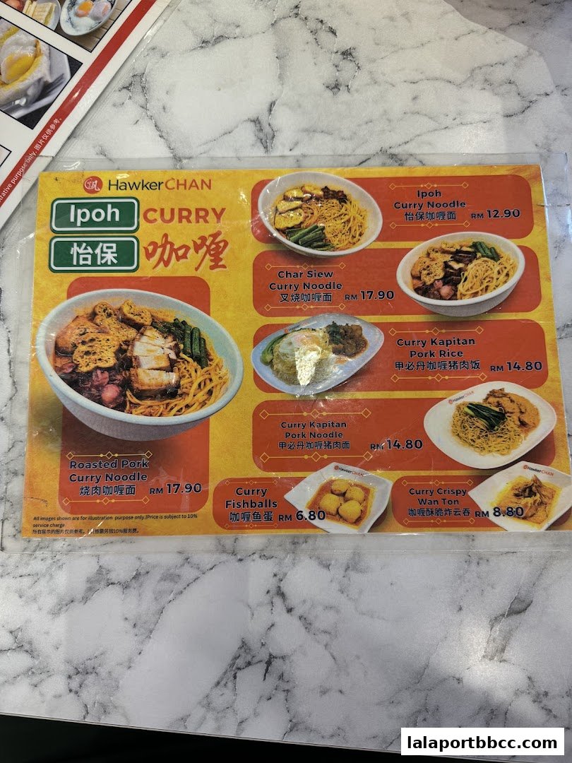 A menu from Hawker Chan LaLaport BBCC featuring various curry noodle and rice dishes.