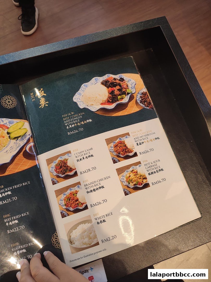 A menu from Mee Hiris China Muslim featuring rice dishes with prices.