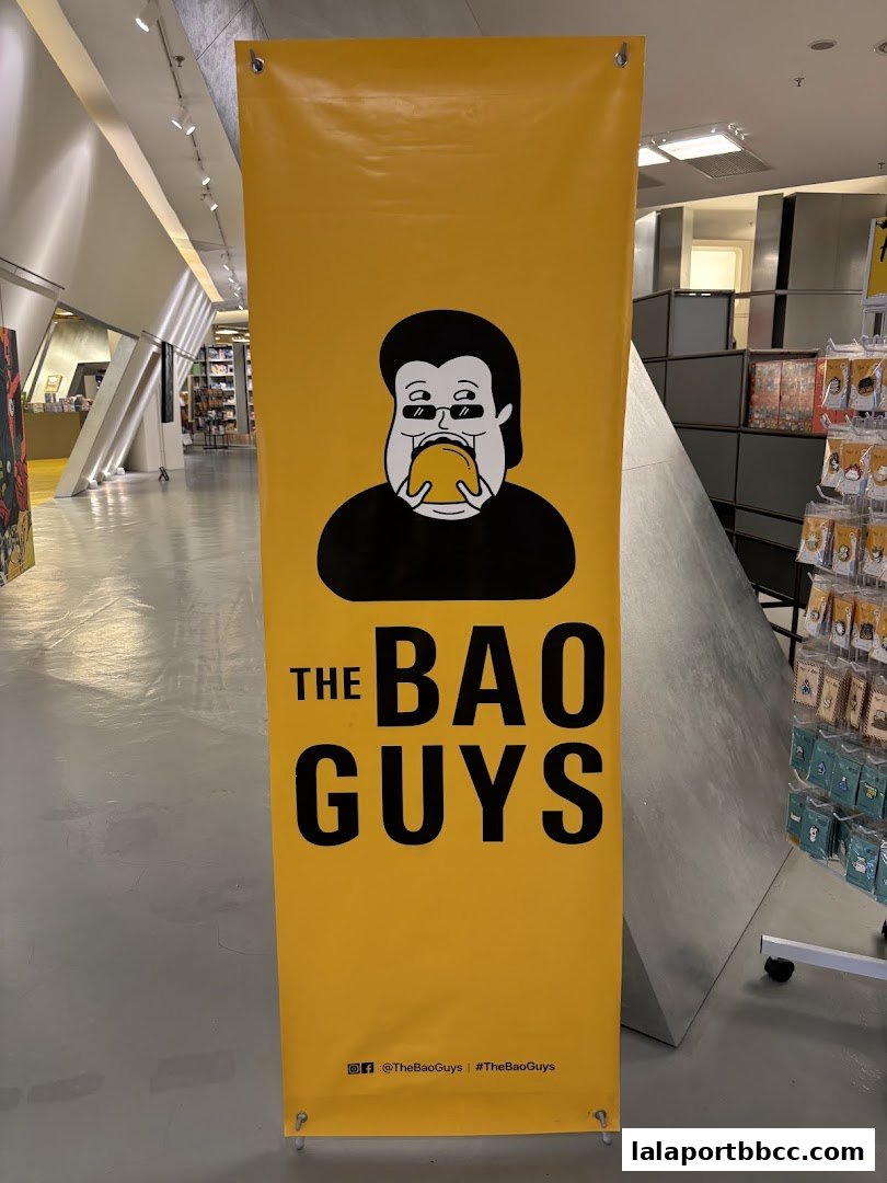 A yellow banner with the logo and name of 'The Bao Guys' is displayed.