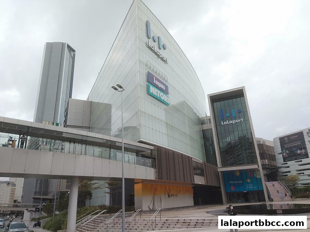 The modern Lalaport shopping mall with a distinctive glass facade and multiple entrances.