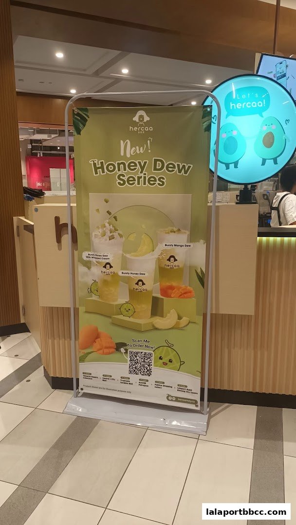 A banner advertising Hercaa's new Honey Dew Series drinks with images of the beverages.