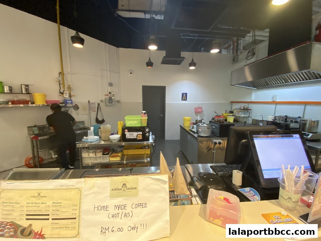 Interior view of Auntie Anna Pak Cik Omar shop with kitchen area and counter.