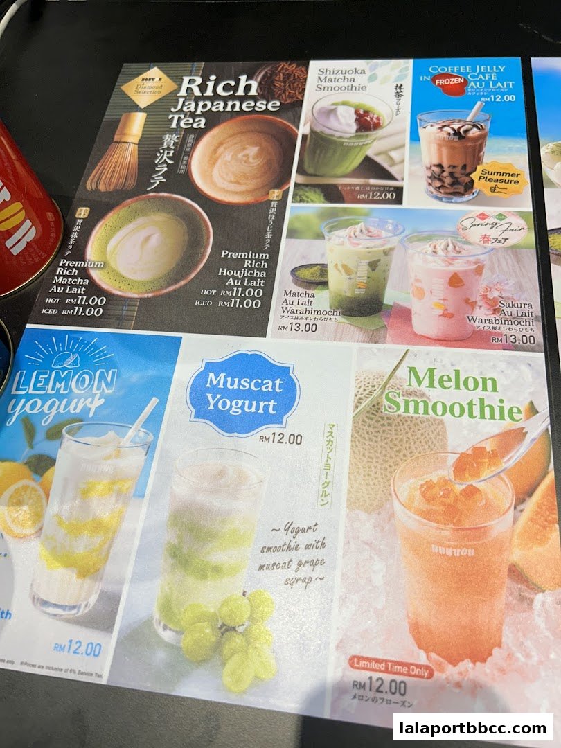 A menu featuring various Japanese-inspired drinks like Rich Japanese Tea, Matcha, and Yogurt smoothies.