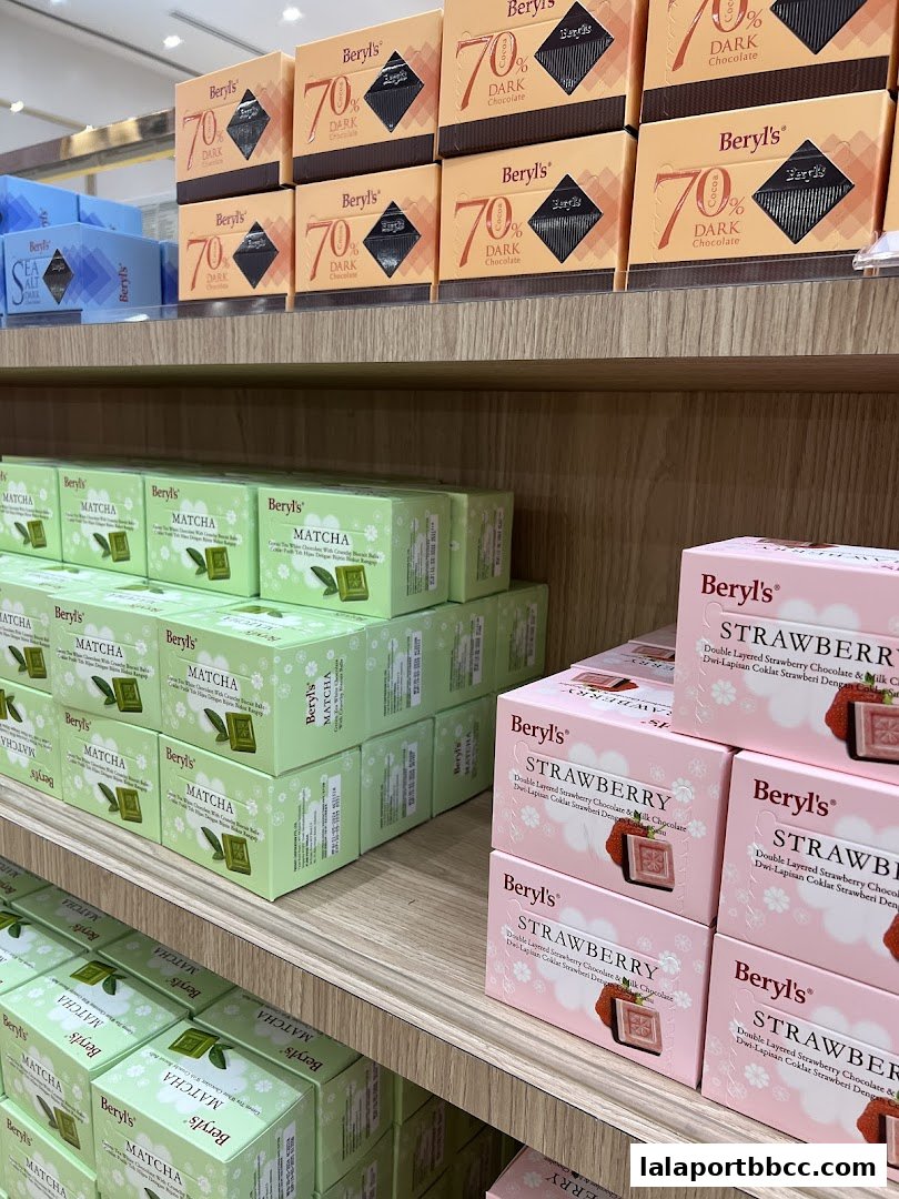 Shelves stocked with various Beryls chocolate boxes, including dark chocolate, matcha, and strawberry flavors.
