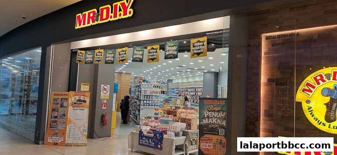 The entrance of MR.DIY store with promotional banners and displays inside.
