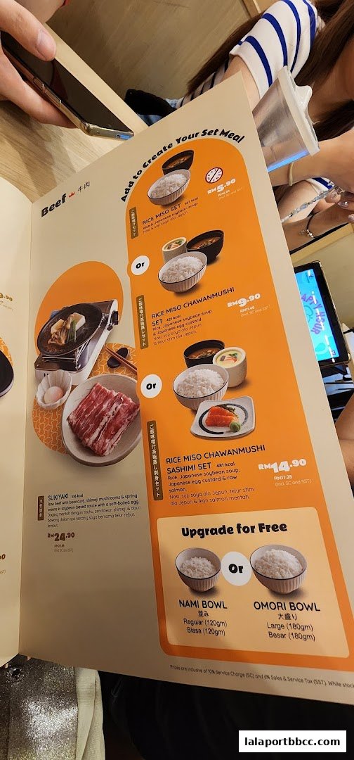A menu page from Sushi King Lalaport BBCC showcasing set meals and upgrades.