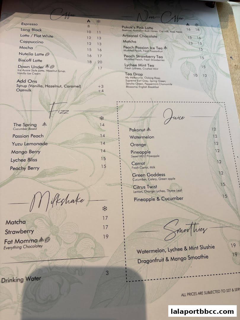 A menu from POKOK LaLaport featuring coffee, non-coffee drinks, milkshakes, juices, and smoothies.