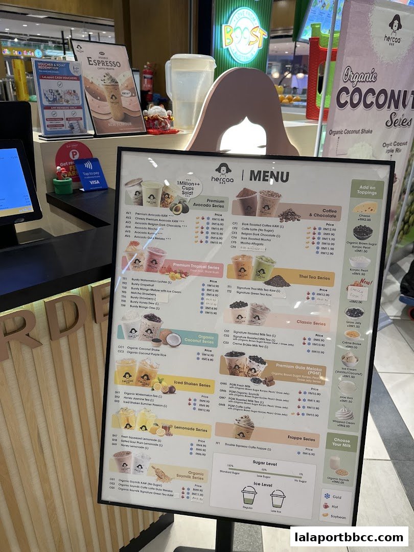 A menu board displaying various drinks and their prices from Hercaa.