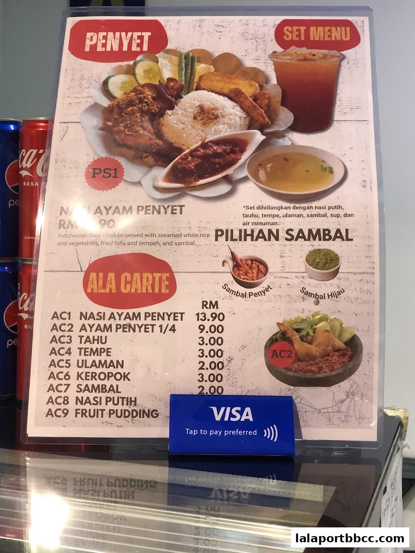 A menu board for Warung Nasi Bonda, featuring set menus and a la carte options.