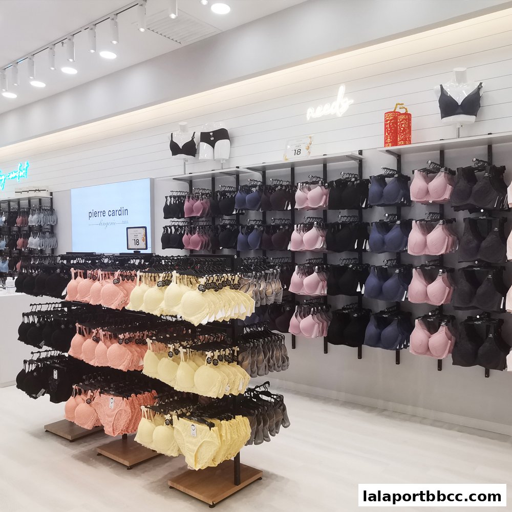Interior view of a Pierre Cardin Lingerie store showcasing a wide selection of bras and lingerie.