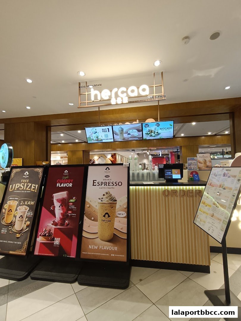 Hercaa Lalaport shop front with promotional displays and an order counter.
