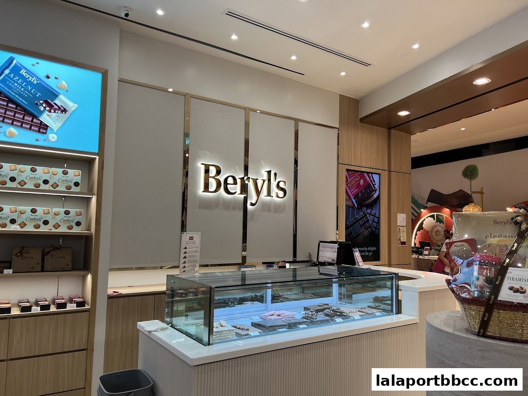Interior view of Beryls Chocolate shop with display cases of chocolates and gift baskets.