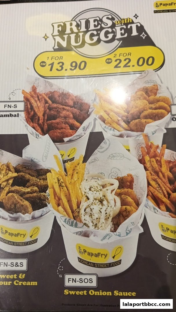 A menu display for PapaFry featuring various fries and nuggets with sauces.