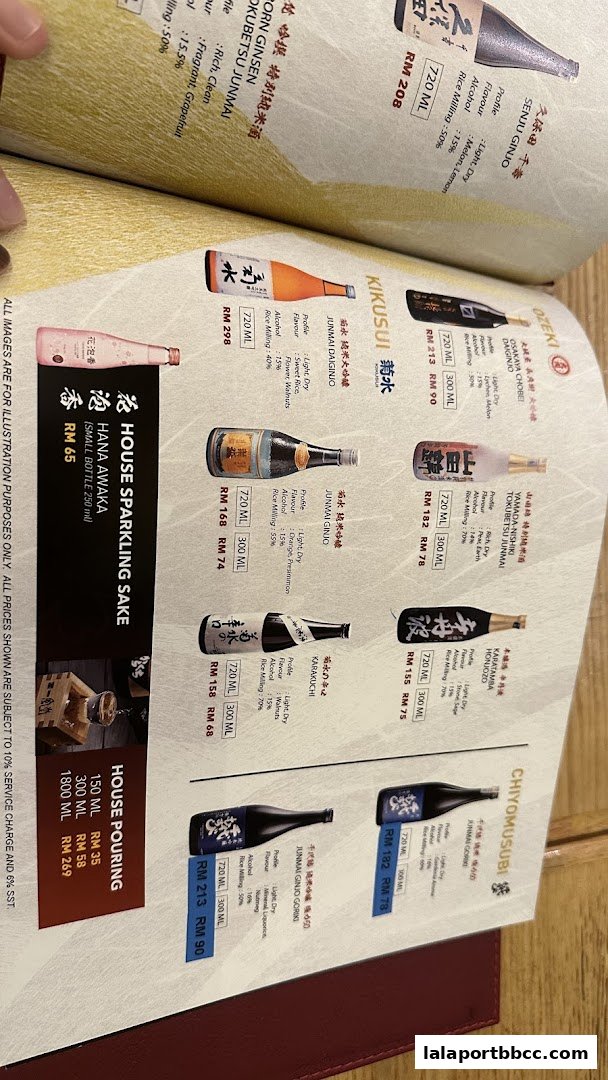 A menu page showcasing various types of sake with bottles and prices.