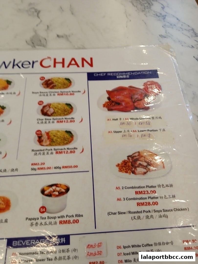 A menu from Hawker Chan LaLaport BBCC featuring signature dishes like Soya Sauce Chicken and Roasted Pork.