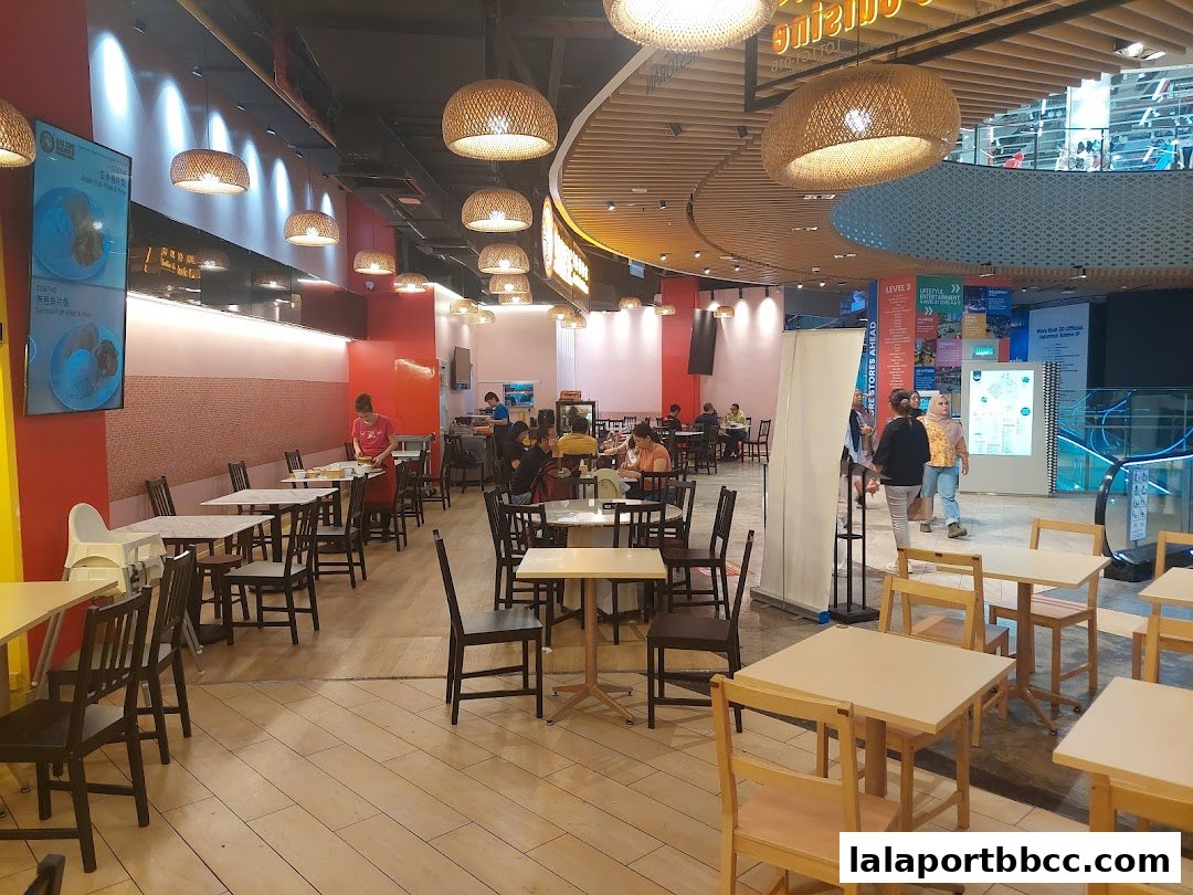 Interior view of Sai Kee Restaurant with tables, chairs, and customers dining.