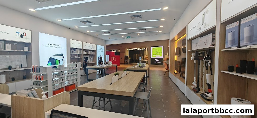 Interior view of a modern Xiaomi store showcasing various electronic products and displays.