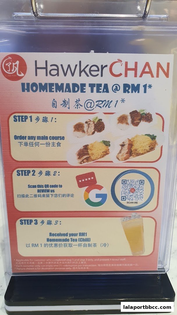 A promotional sign for Hawker Chan offering homemade tea at RM1 with purchase of a main course.