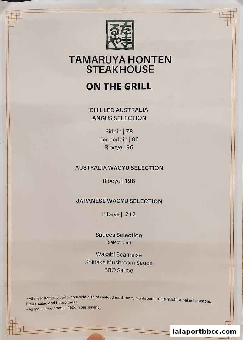 A menu from Tamaruya Honten Steakhouse featuring grilled selections of Angus and Wagyu beef.