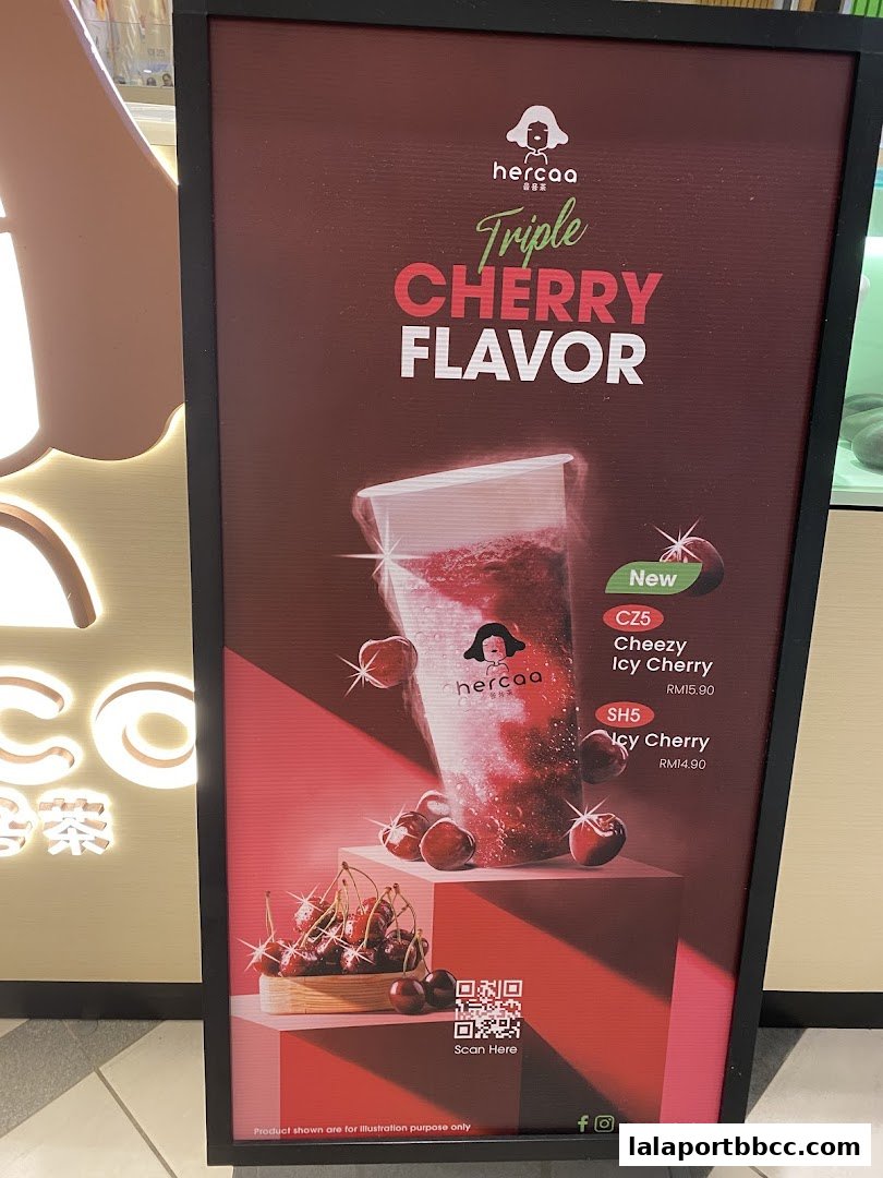 A promotional poster for Hercaa's Triple Cherry Flavor drinks, featuring a cherry beverage and product details.