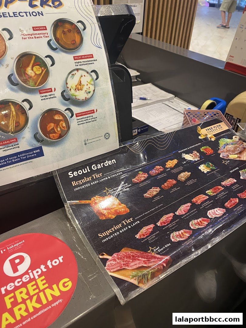A menu from Seoul Garden showing various meat and seafood options for Korean BBQ.