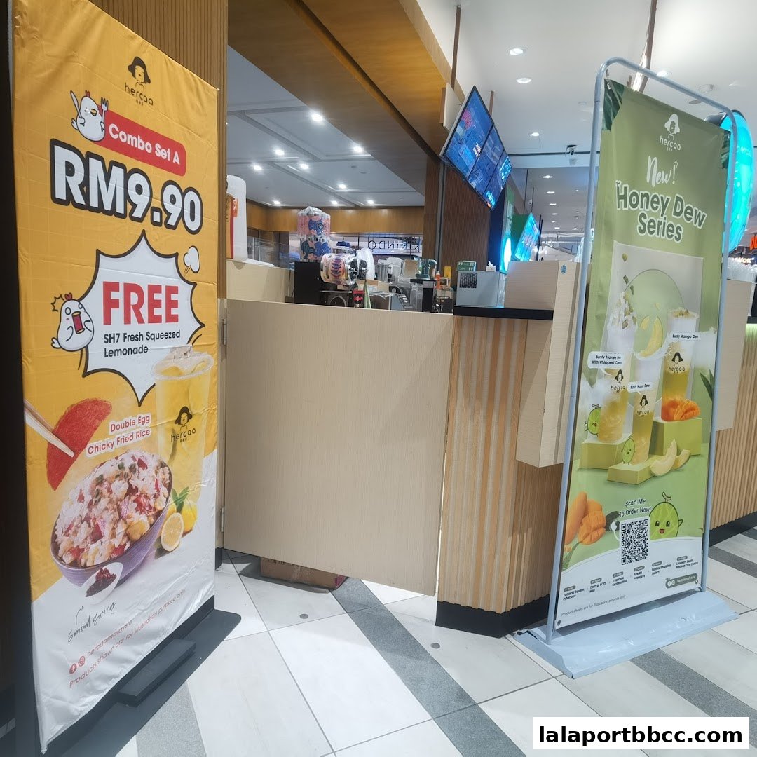Banners promoting Hercaa's Combo Set A with free lemonade and their new Honey Dew Series.
