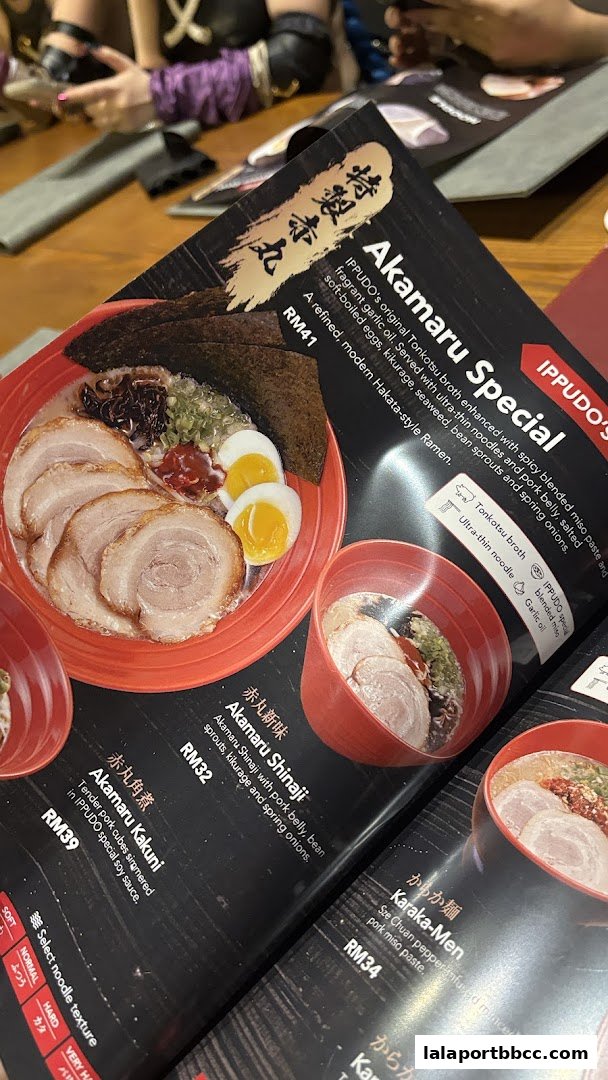A menu from IPPUDO LaLaport BBCC showcasing various ramen dishes with descriptions and prices.