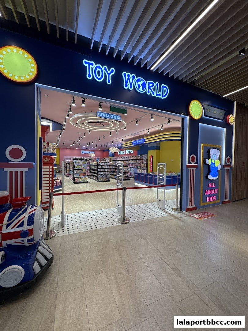 The bright and inviting entrance of Toy World, featuring colorful displays and a welcoming atmosphere.
