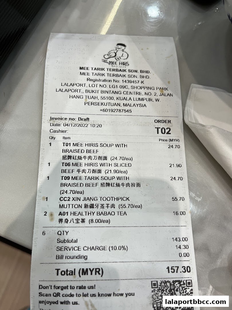 A receipt from Mee Hiris China Muslim restaurant detailing food orders and total cost.