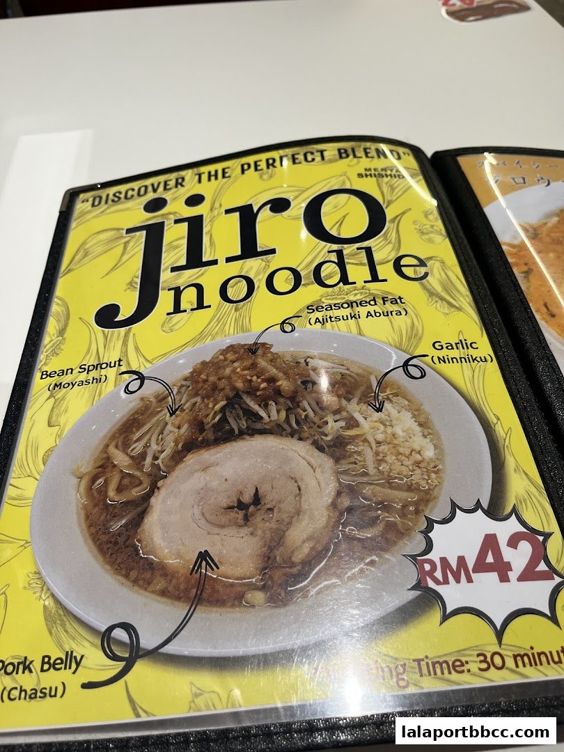 A close-up of a Jiro noodle menu item with detailed ingredients and price.