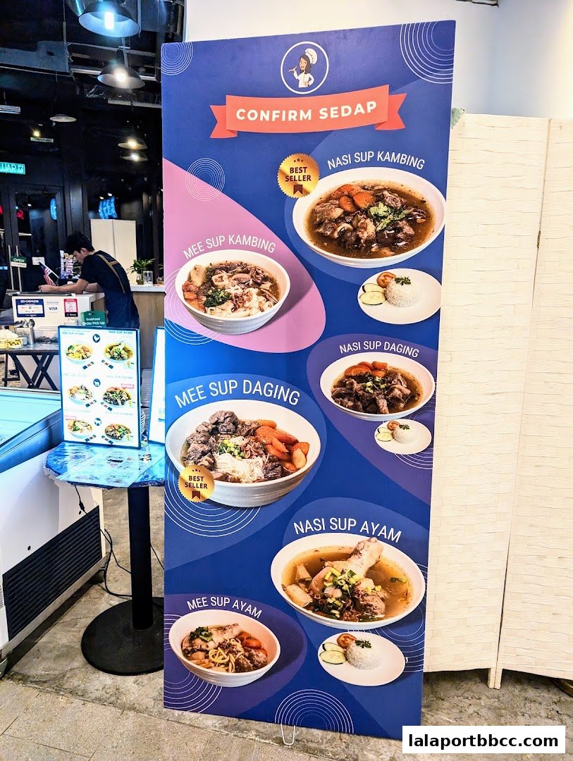 A promotional banner showcasing various soup dishes from Confirm Sedap.