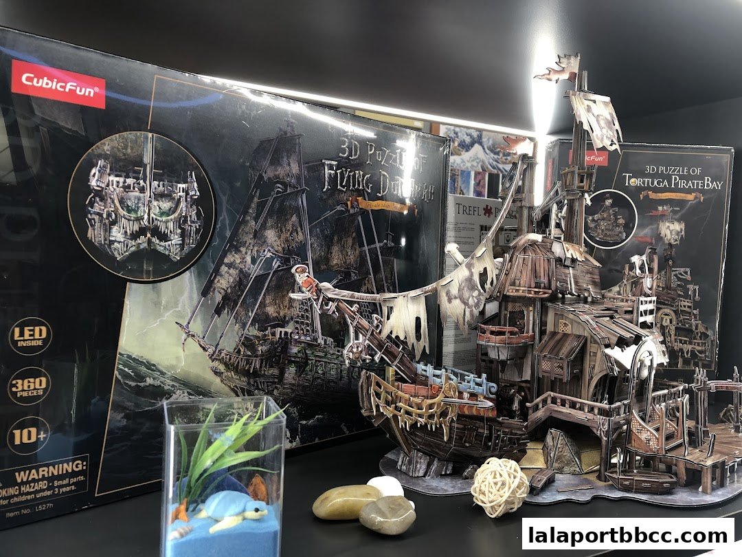 Intricate 3D pirate ship puzzles displayed with their boxes and decorative elements.