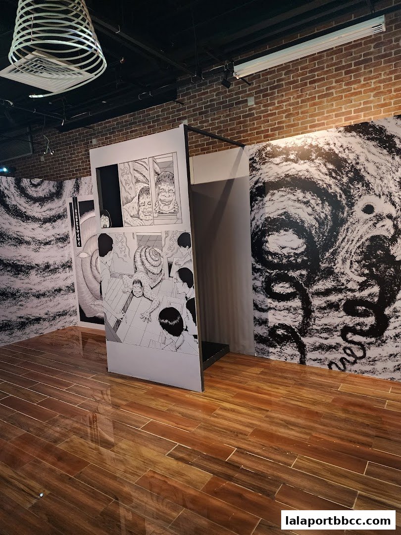 Interior of the Junji Ito Horror House with manga panels and artwork on display.