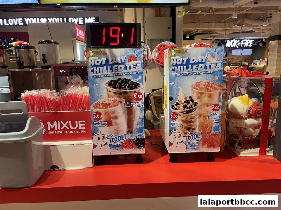 A display of Mixue's chilled teas and ice cream products with prices.