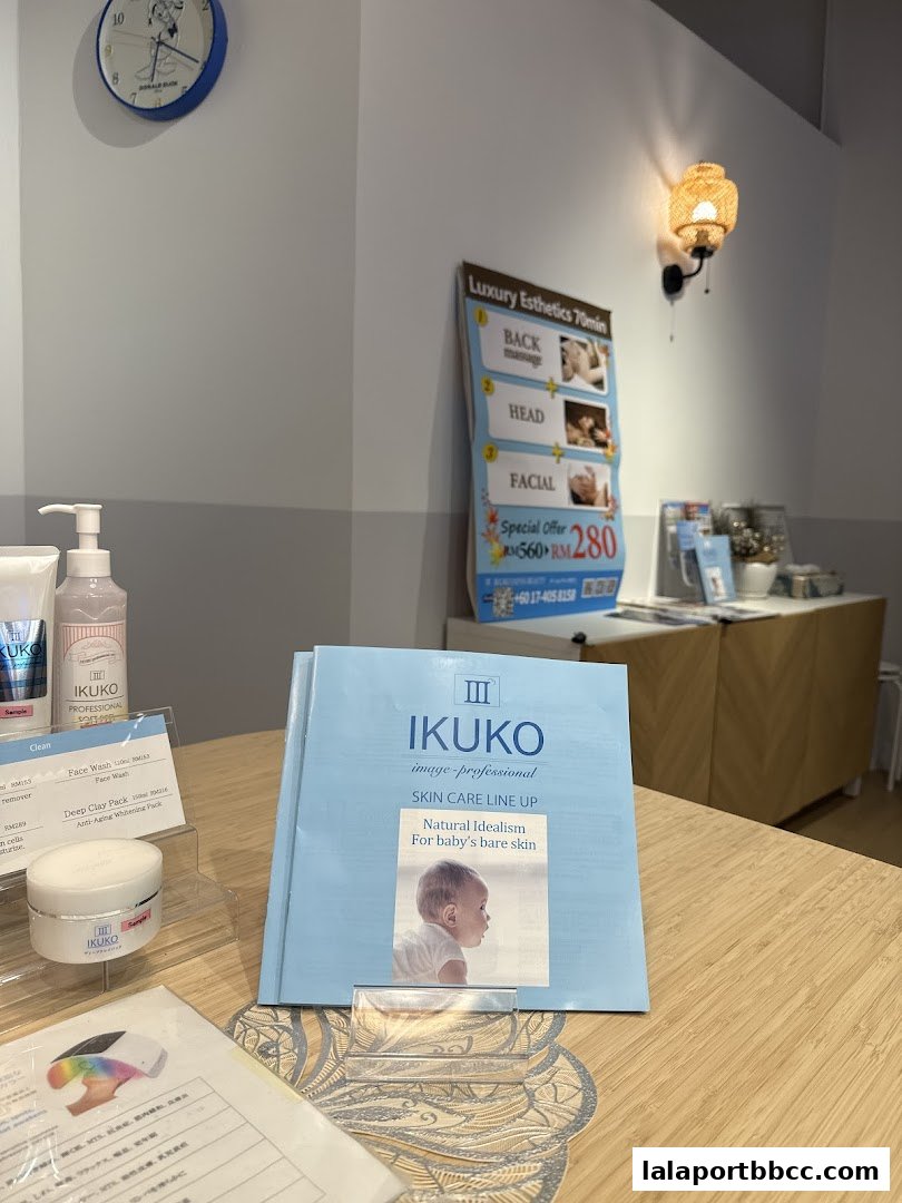 A display of IKUKO beauty products and a promotional flyer for luxury esthetics.