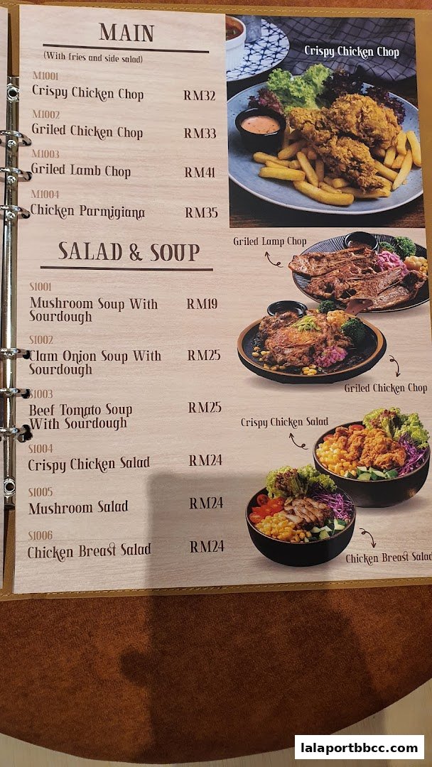 A menu from V88 Cafe and Bar featuring main courses, salads, and soups with prices.